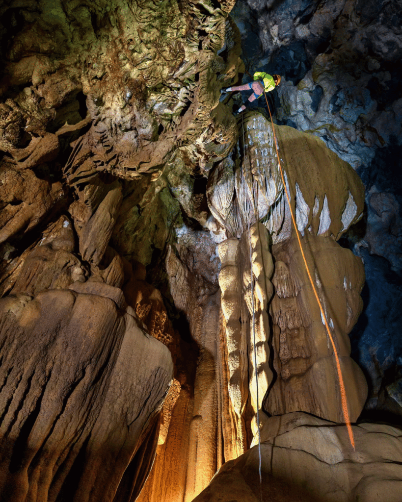 Visitors rappelling 20 meters down into the entrance of Thang Cave (source: Jungle Boss)