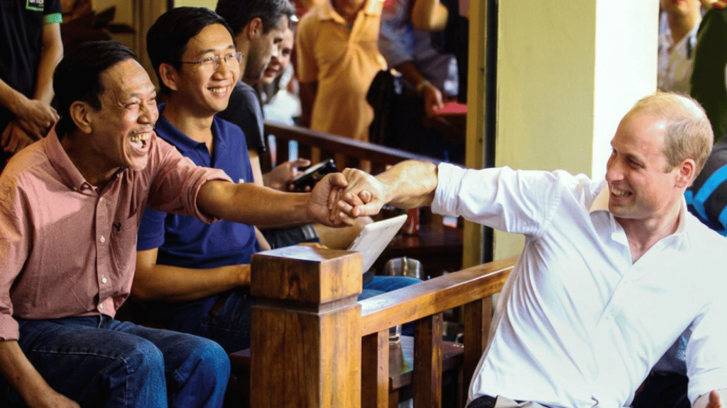 Prince William visits a local café on Thuoc Bac Street and chats with residents