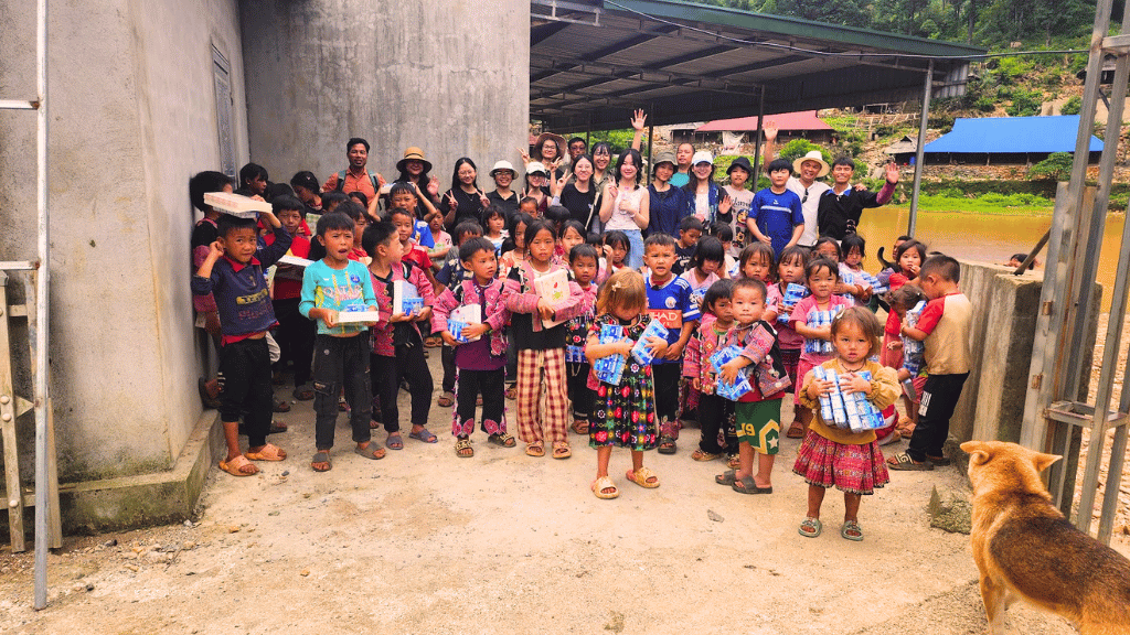 Hanoi Voyages team organizing a volunteer day in Thung Mai village to support local children