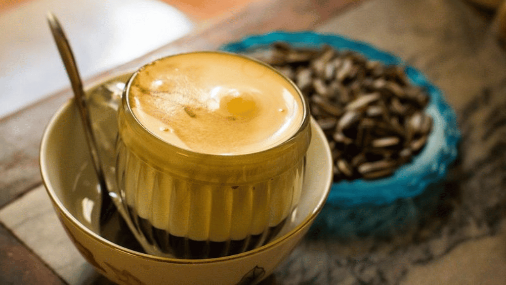 Vietnamese egg coffee topped with a creamy whipped egg mixture