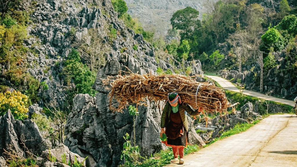 Local people going about their daily lives in Lao Xa village