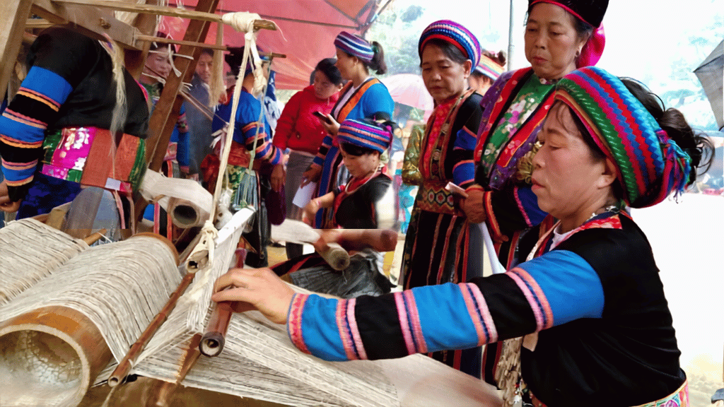 Local women practicing traditional hemp weaving in Ha Giang