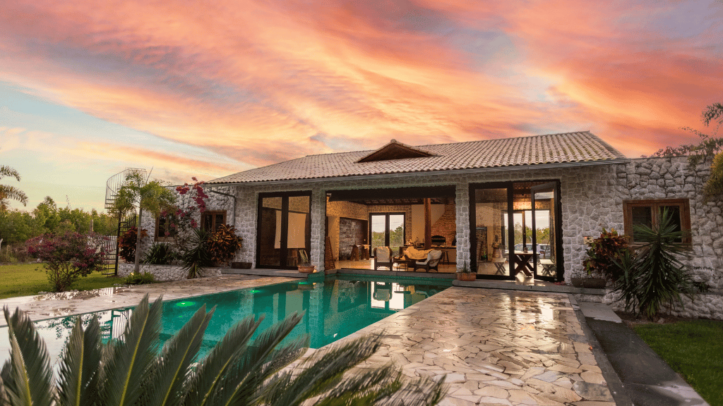 Relaxing villa with an outdoor pool and wide open garden setting