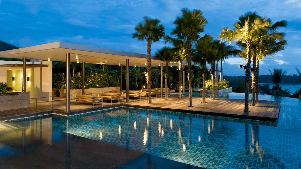Outdoor villa with a private pool and open green surroundings