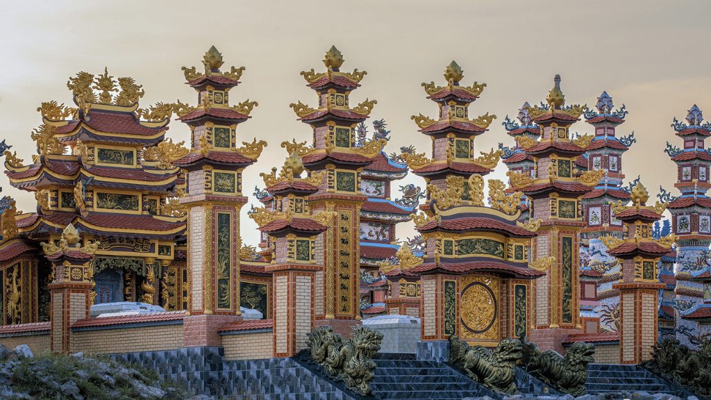 Tombs echoing the mausoleum of Emperor Khai Dinh, each reworked to suit the taste of the family behind it