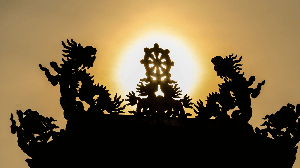 Intricate patterns carefully carved and detailed on a tomb at An Bang Cemetery