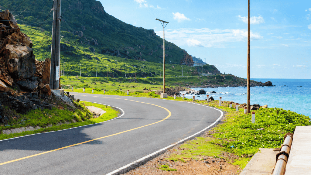 A peaceful stretch of coastline surrounded by mountains in Con Dao