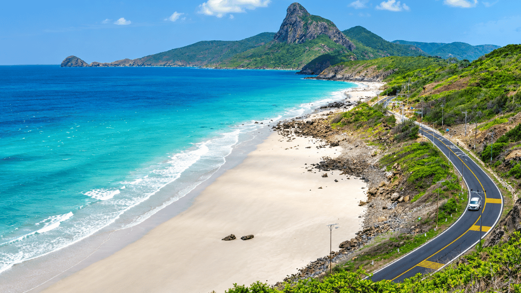Coastal road along the turquoise waters of Con Dao Island, Vietnam