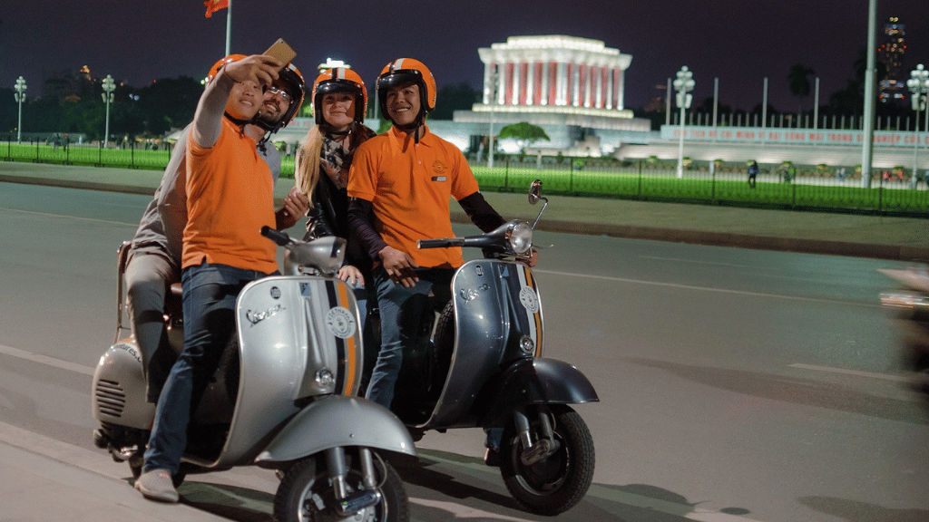 Exploring Hanoi with a local guide behind the handlebars