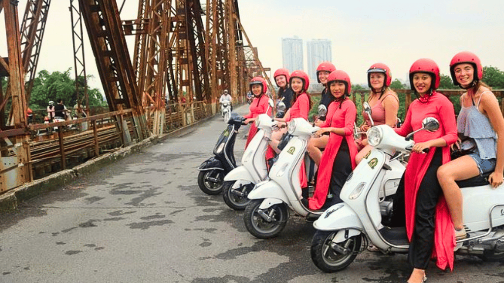 Explore Hanoi by Vespa with female riders in ao dai