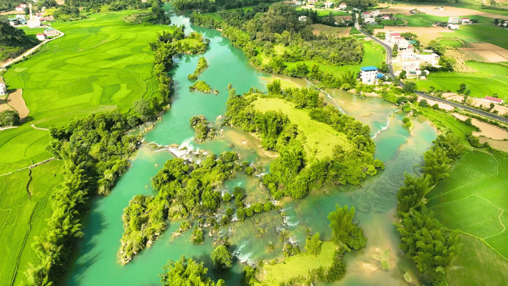 Quay Son river surrounded by mountains and rice fields